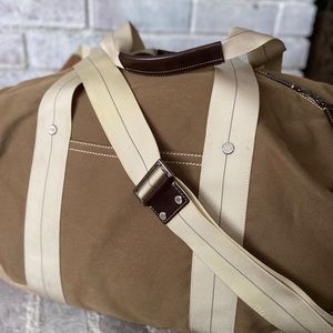 Coach Men’s Weekend Duffel Bag, canvas and leather